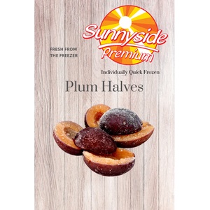 Image of plum halves. Red skin and yellow flesh